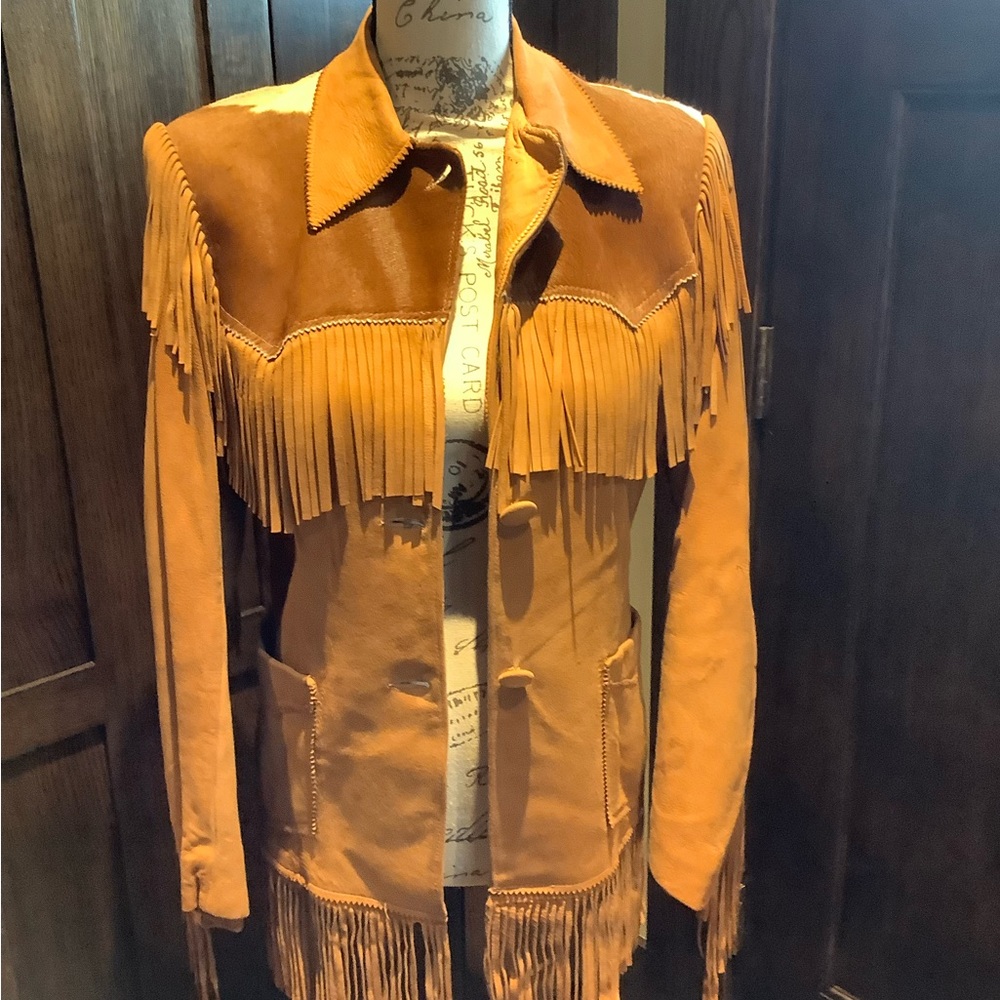 Authentic Levi Strauss women’s , vintage 1945, suede and cow hide coat.